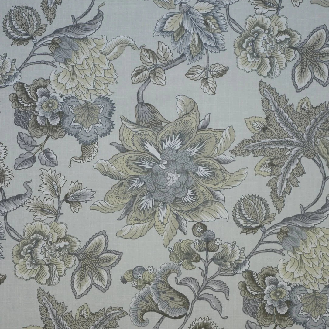 Floral patterned fabric with green and gray flowers on a light background