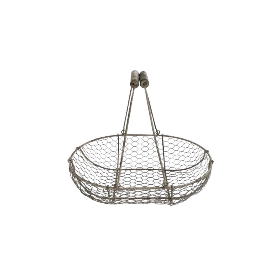 Wire basket with handles on a white background