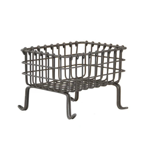 Wrought iron fire basket on a white background
