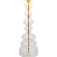 Table lamp with a clear glass base and white shade on a white background