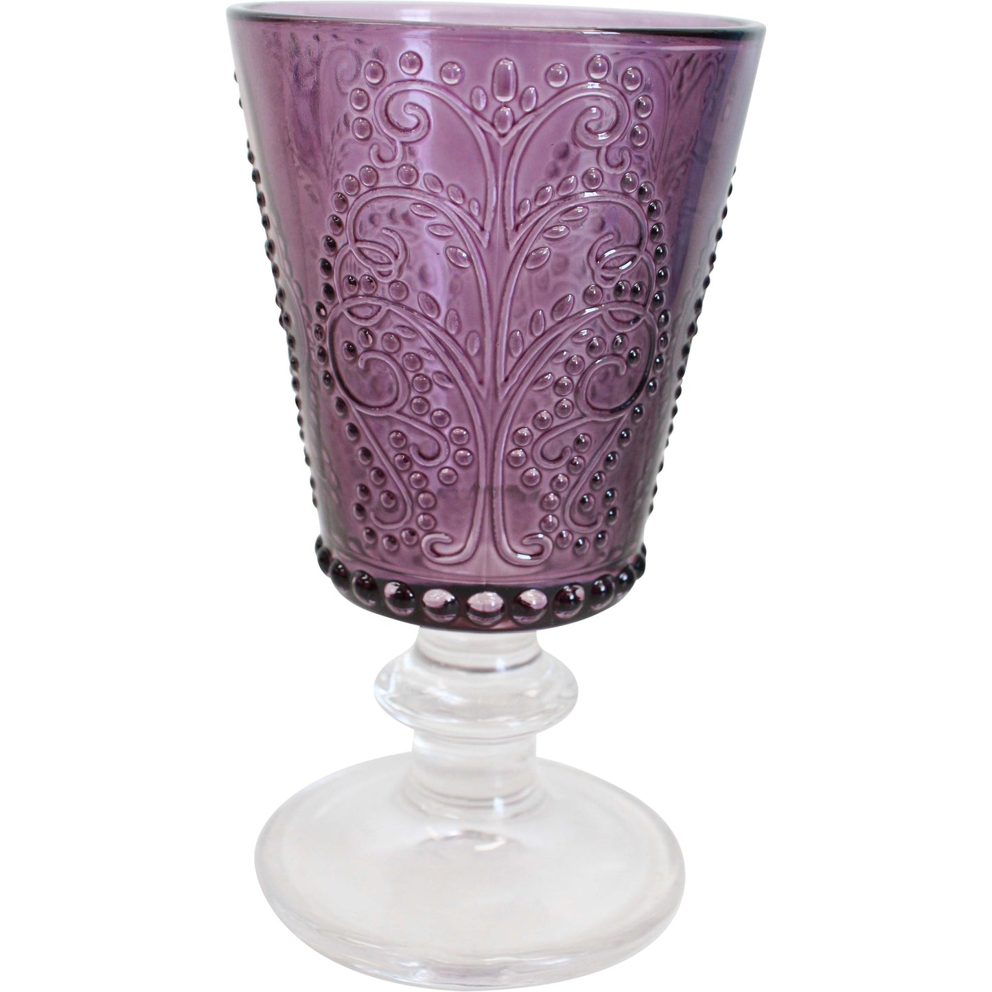 Purple glass goblet with intricate designs on a white background