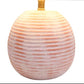 Round ceramic lamp with ribbed texture on a white background