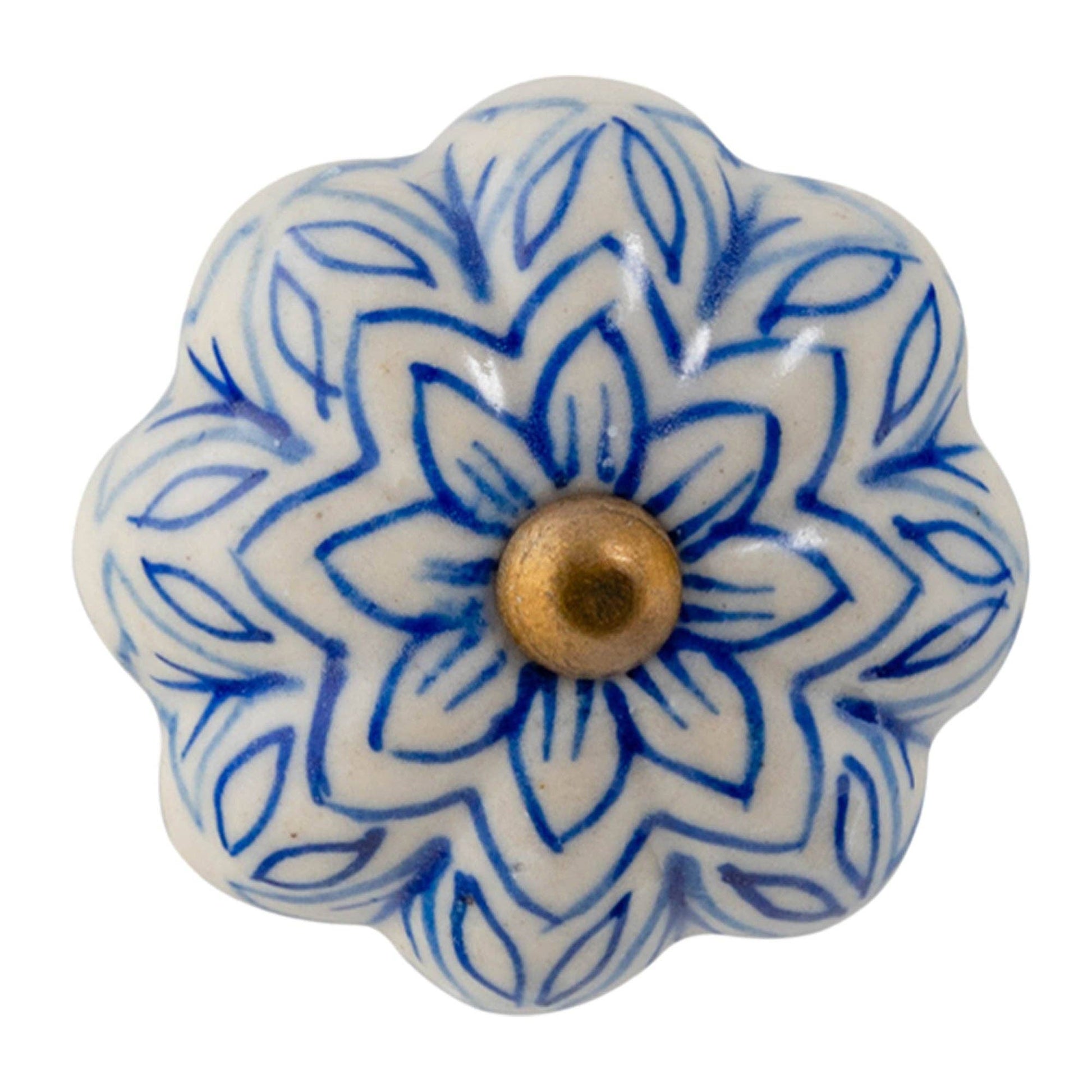 Decorative ceramic knob with blue floral pattern and gold center on a white background