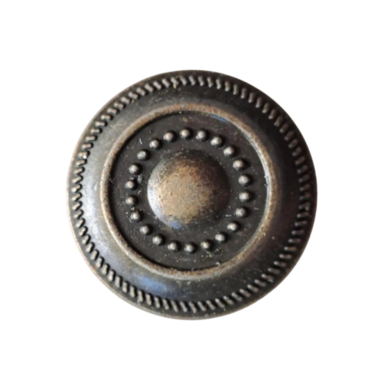 Decorative metal knob with intricate design on a white background