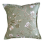 Decorative pillow with floral pattern on a white background