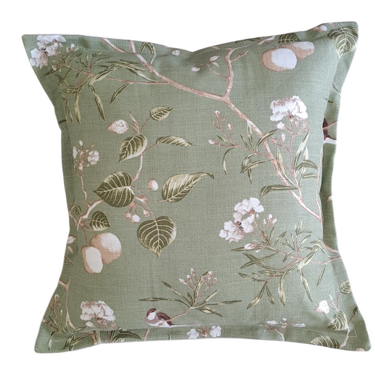 Decorative pillow with floral pattern on a white background