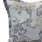 A square decorative throw pillow featuring a classic floral toile pattern in muted gray, beige, and olive green tones on a light gray background.