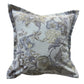 A square decorative throw pillow featuring an intricate floral damask pattern in muted gray, beige, and olive tones, set against a plain white background.
